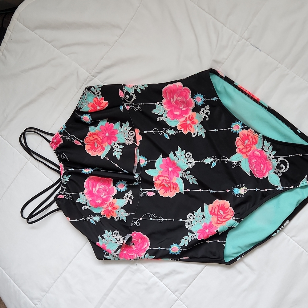 Girls Black Ruffle top  one piece swimsuit. Size 18.
